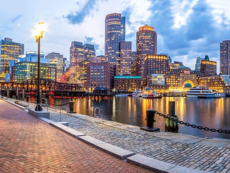 Boston waterfront skyline with city buildings, harbor views, and downtown landscape for Boston land surveying services