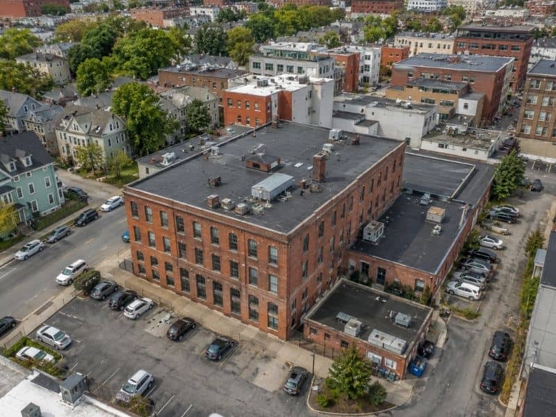 Aerial view of an older Boston, MA commercial property relevant to an ALTA survey
